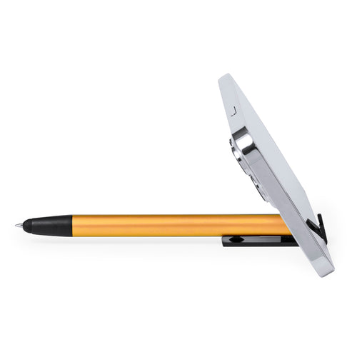 Caneta dourada em alumínio com clip preto e gravação laser “Vtote”, com suporte para telemóvel integrado, fotografada em fundo escuro com iluminação de estúdio.