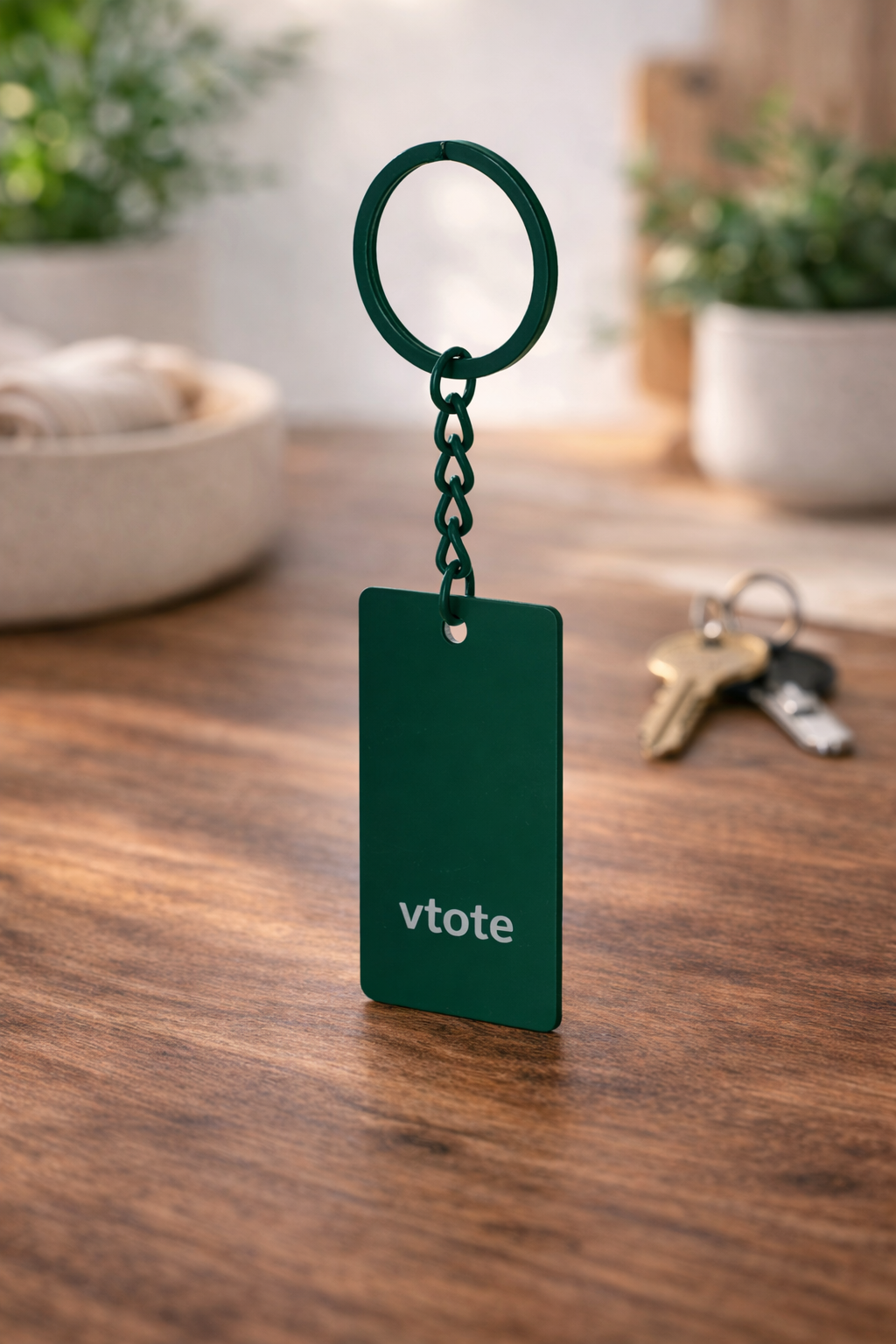 Chaveiro em aço inoxidável com acabamento emborrachado e gravação laser personalizada Vtote